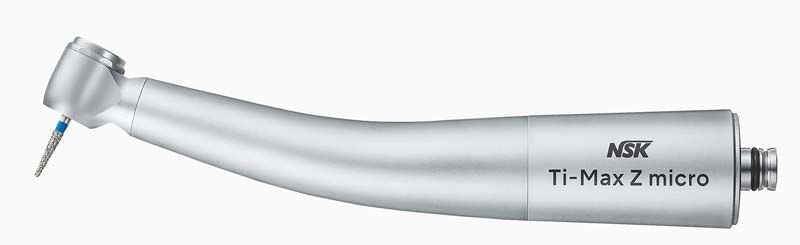 Dentalturbine Ti-Max Z micro in silberner Farbe mit Bohrer.