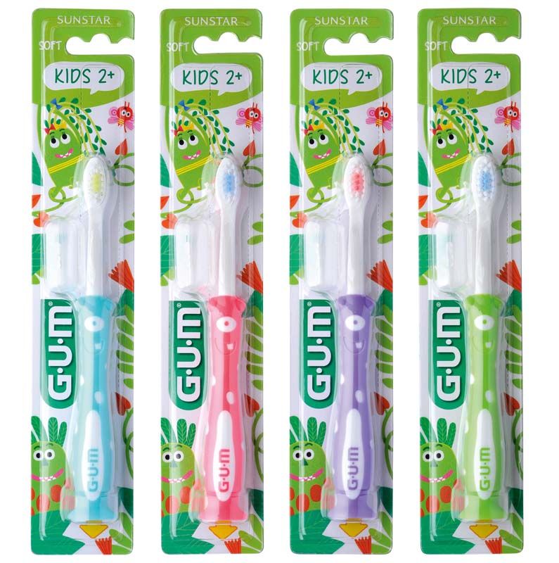 Vier GUM® KIDS Zahnbürsten in verschiedenen Farben mit fröhlichem Froschmotiv.