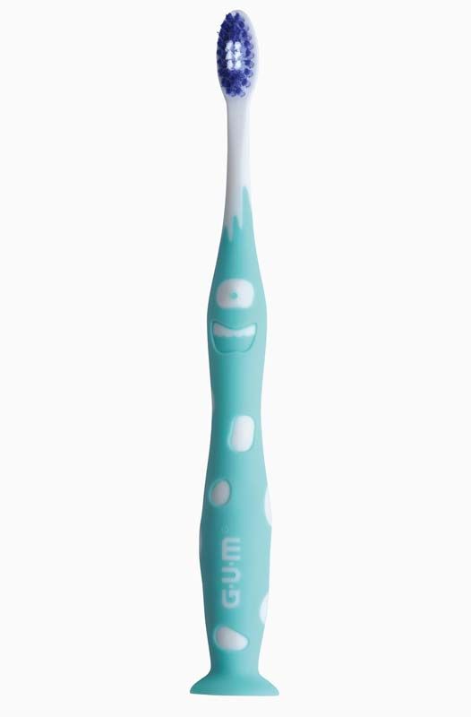 Kinderzahnbürste GUM® JUNIOR, blaues Design mit lustigem Gesichtsmuster.