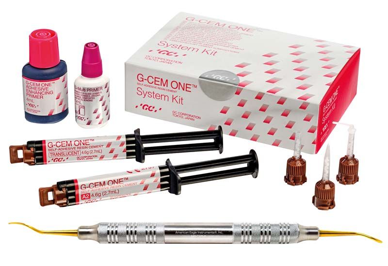 G-Cem ONE System Kit mit zwei Spritzen, Fläschchen und Handinstrument.