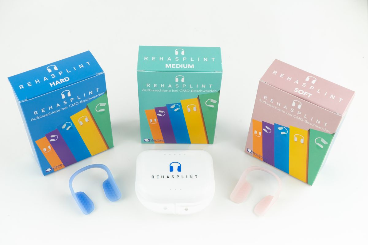 RehaSplint Hart, Medium und Soft Aufbissschienen mit jeweiliger Verpackung.