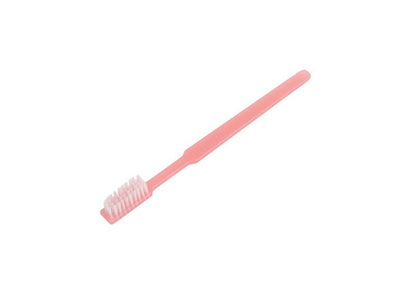 Einmalzahnbürste in Pink mit vier Reihen Borsten auf weißem Hintergrund.