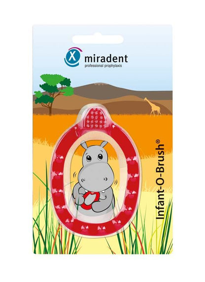 Rote Infant-O-Brush® Babyzahnbürste mit Beißring und Nilpferdmotiv auf Verpackung.