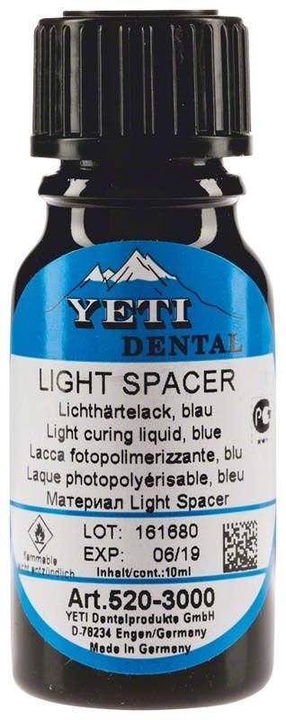 Lichthärtelack Light Spacer von Yeti Dental in blauer Flasche.