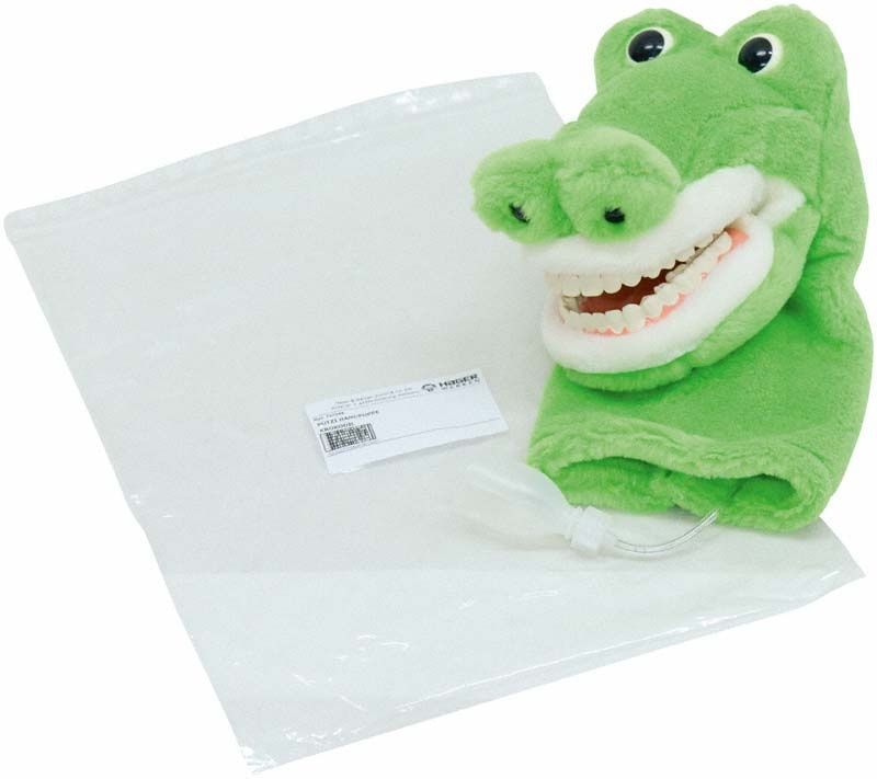 Plüsch-Krokodil-Handpuppe mit sichtbaren Zähnen auf weißem Hintergrund.