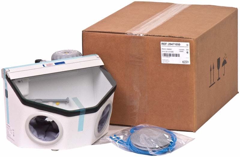 Kompaktes Renfert Feinstrahlgerät mit Kartonverpackung und Zubehörteilen.