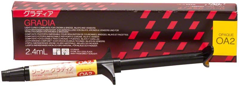 Gradia Opaque OA2 Spritze vor Verpackung mit rot-schwarzem Design.