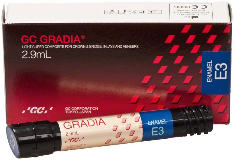 GC Gradia Enamel E3 Komposit-Spritze vor der Produktverpackung.
