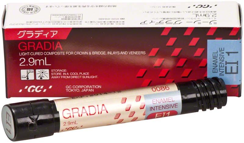 Gradia Enamel Intensive EI1 Tube vor Verpackung mit Produktinformationen.
