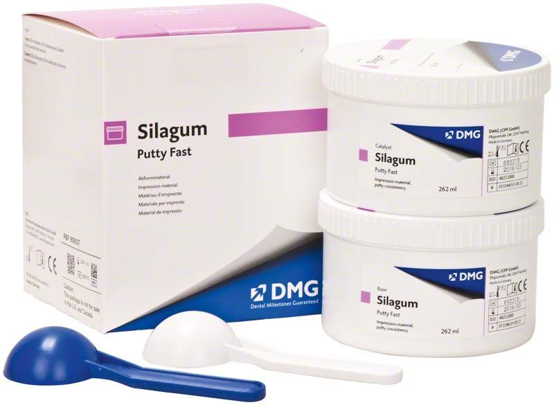 Silagum Dosen putty fast, zwei Behälter mit Dosierlöffeln vor Verpackung.