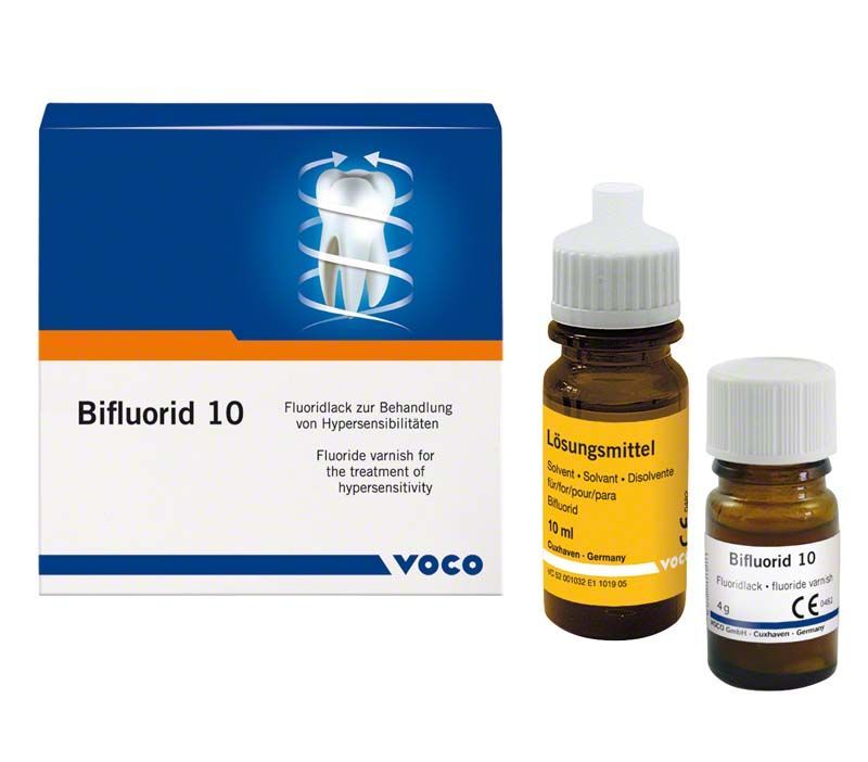 Bifluorid 10 Zahnlack-Flasche und Lösungsmittel vor Verpackung.