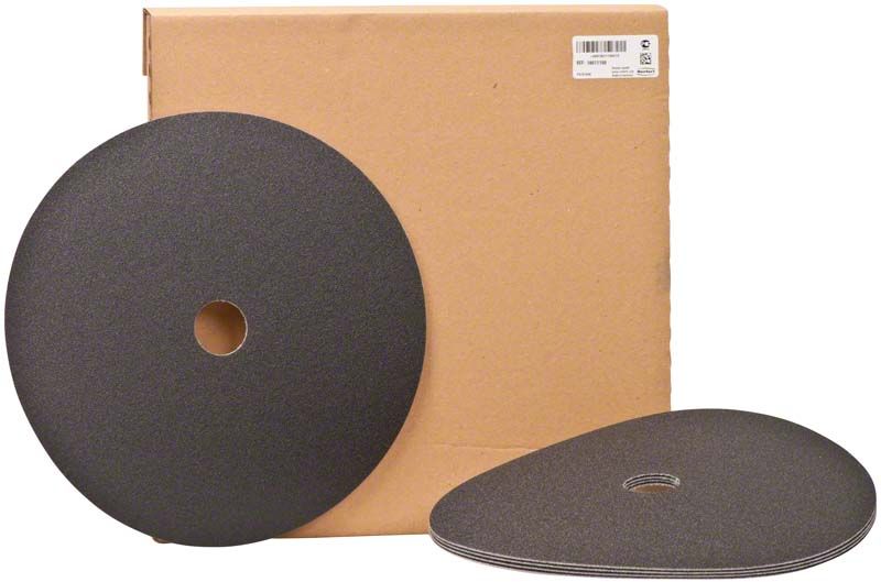 Trimmerscheiben Klettfix für Nasstrimmen vor brauner Verpackung.