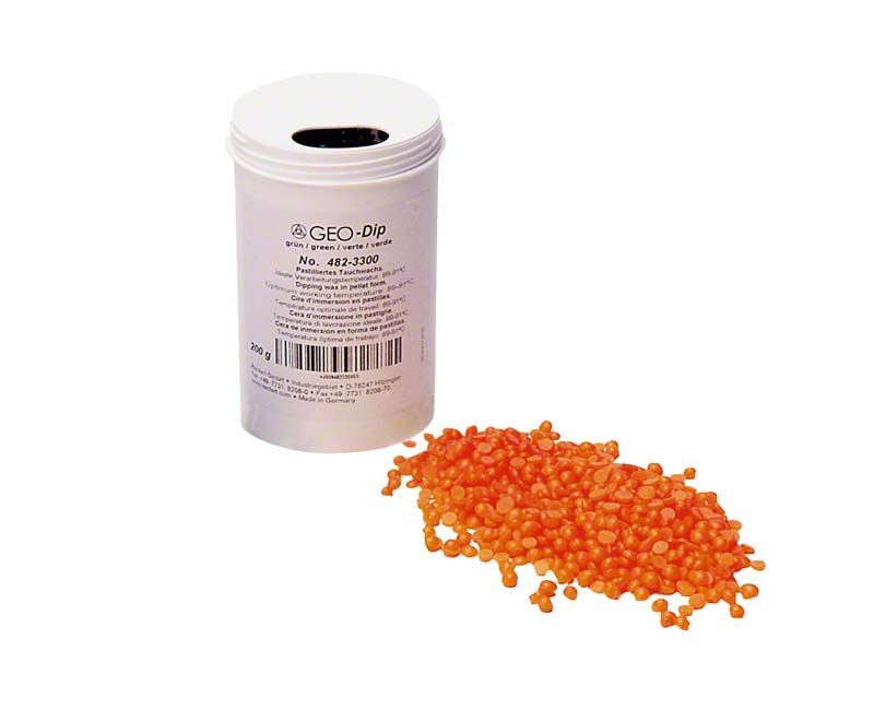 GEO Dip orange-transparente Kügelchen neben weißem Behälter.