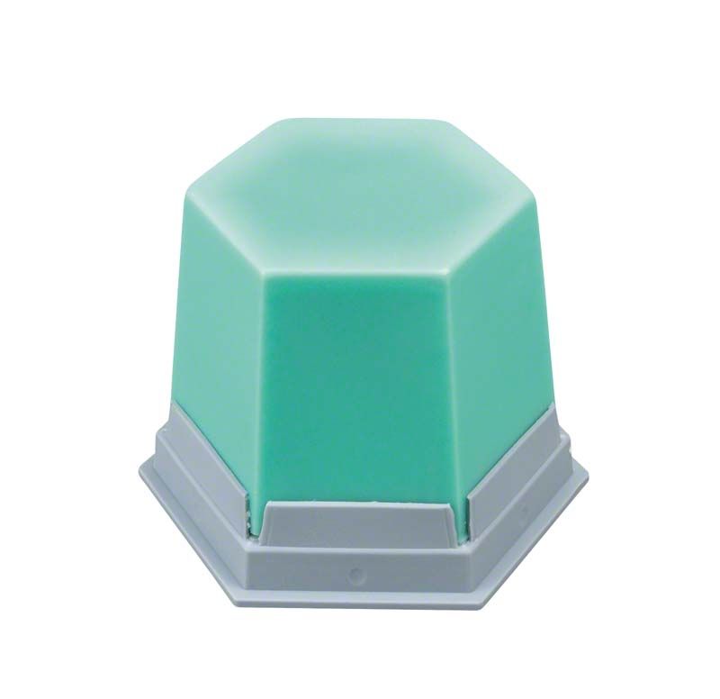 Mintgrünes Modellierwachs für Zahntechnik in hexagonaler Form auf grauer Basis.
