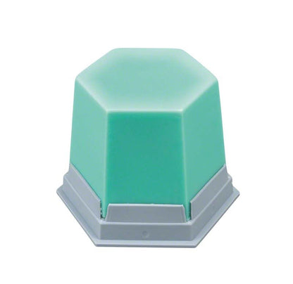 Mintgrünes Modellierwachs für Zahntechnik in hexagonaler Form auf grauer Basis.