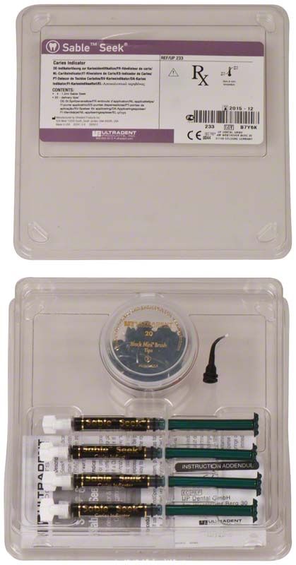 Karies-Indikator-Kit mit drei Applikationsspritzen und Zubehör in Verpackung.