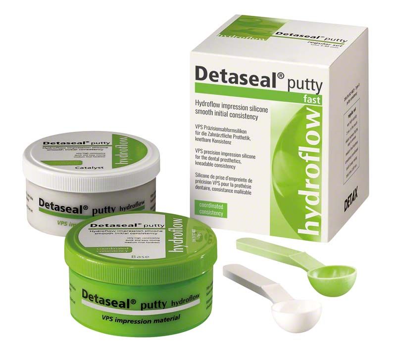 Detaseal hydroflow Putty Abformmaterial mit Katalysator und Dosierlöffeln.