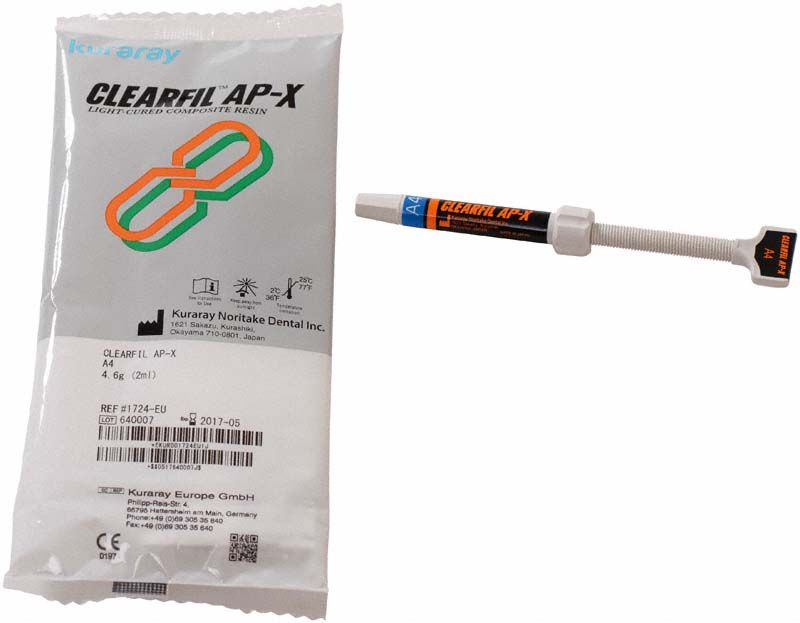 Klarfil AP-X Spritze A4 neben Verpackung mit Produktinformationen.