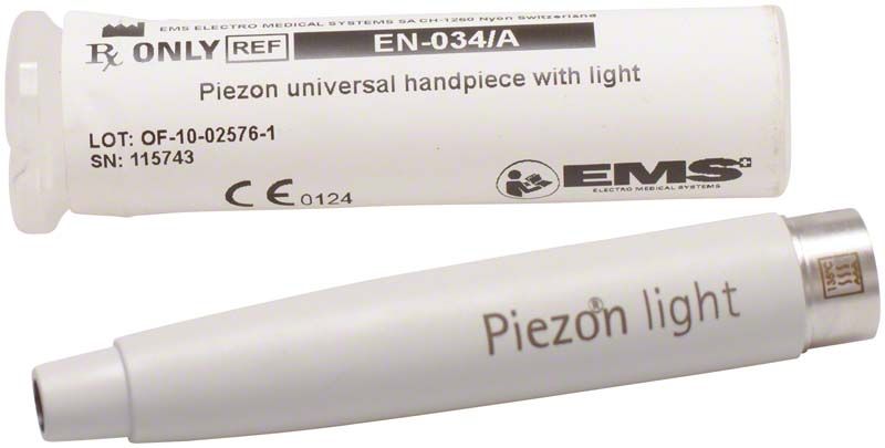 Piezon Universalhandstück mit Licht und Verpackung, Detailansicht.