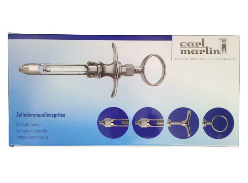 Zylinderampullenspritze aus verchromtem Messing auf einer Verpackung mit Produktabbildungen.