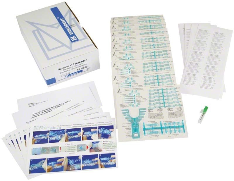 Silensor-sl Teilekarten-Set mit Anleitungen und Zubehörteilen auf Tisch.