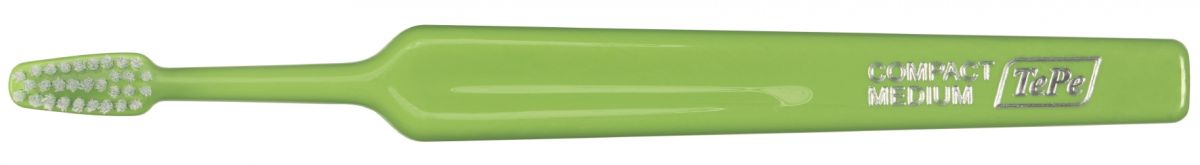 TePe Select Compact Zahnbürste mit grünem Griff und kompaktem Bürstenkopf.