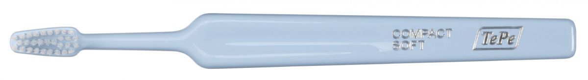 TePe Select Compact Soft Zahnbürste mit ergonomischem Griff in Blau.