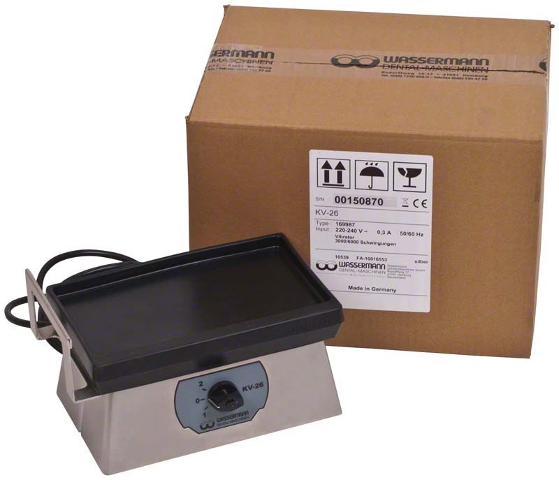 Vibrator KV-26 Edelstahl mit Steuerknopf und Kartonverpackung im Hintergrund.