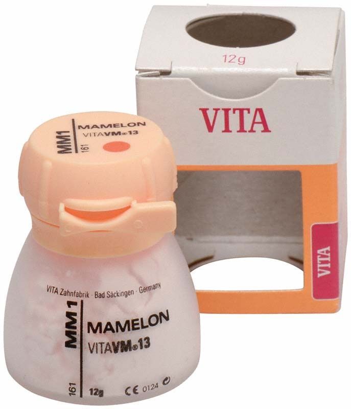 Verpackung des VM13 Mamelon MM1 Zahnmassenpulvers mit geöffneter Schachtel.