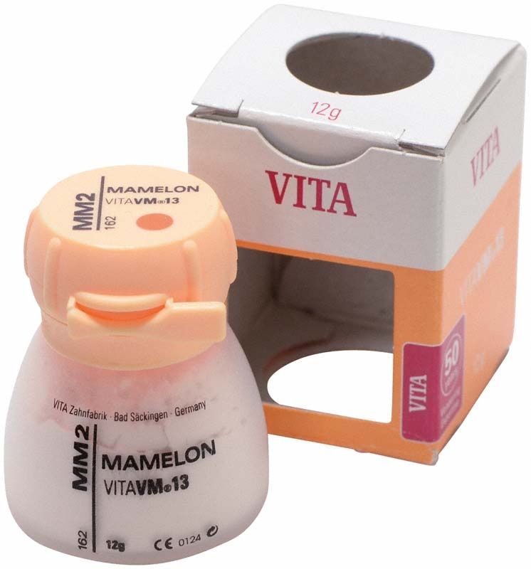 Mamelon-Farbpulver VM13 MM2 in weißer Plastikdose mit geöffneter Verpackung.