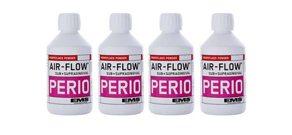 Vier Flaschen AIR-FLOW® Pulver PERIO mit lila Etikett für subgingivale Prophylaxe.