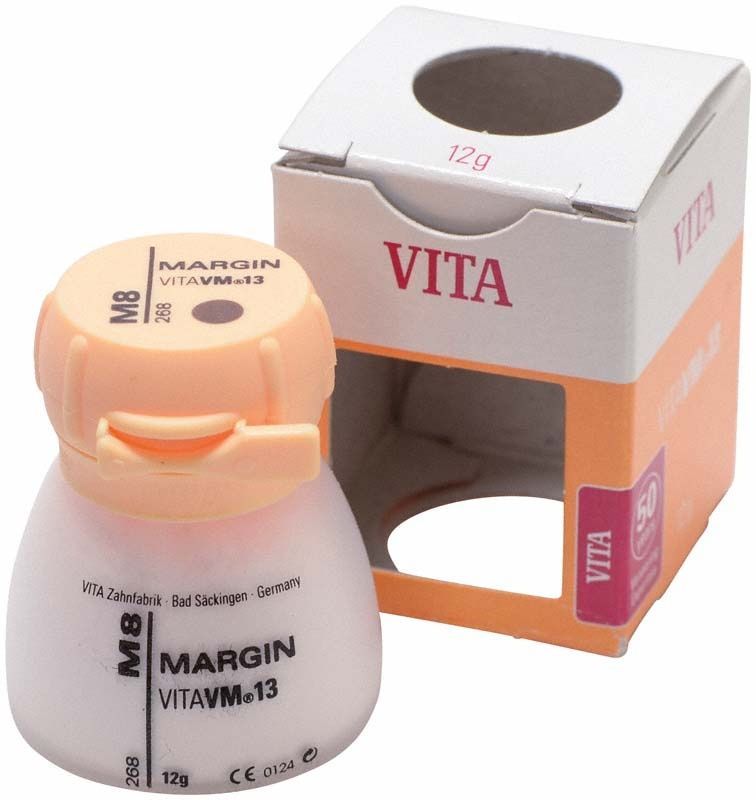 Margin VM13 M8 Zahnmaterial in weißem Behälter mit geöffneter Verpackung.