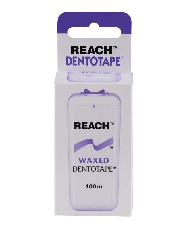 Reach Dentotape gewachste Zahnseide 100 m in lila-weißer Verpackung.