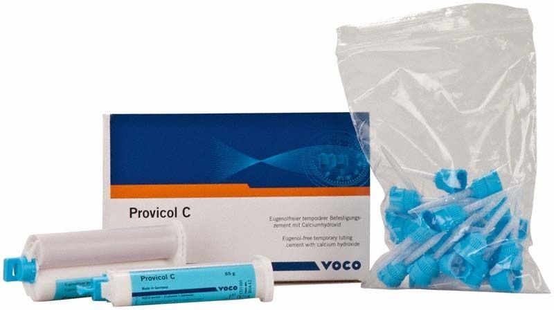 Provicol C Befestigungszement mit Verpackung und Zubehörteilen auf weißem Hintergrund.