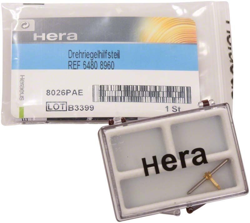 Drehriegel-Bausatz von Heraeus mit Verpackung und Einzelteil.