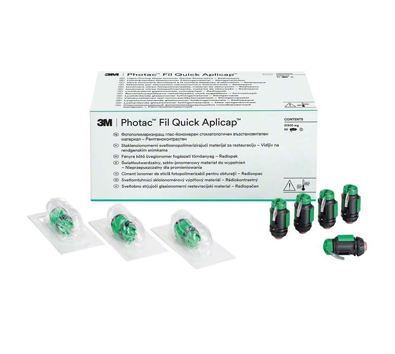 Lichthärtendes Glasionomer Füllungsmaterial Photac™ Fil Quick Aplicap™ mit grün-schwarzen Kapseln.