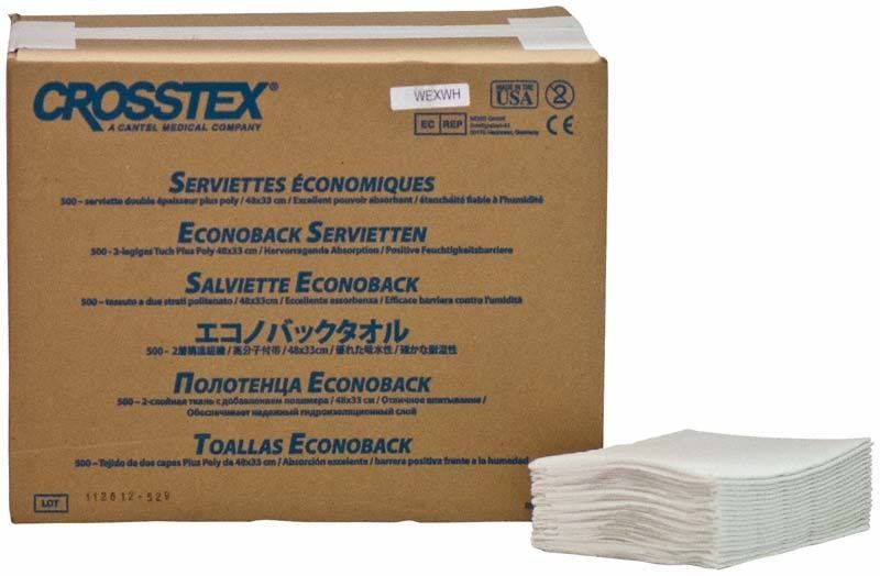 Crosstex Patientenservietten weiß in Verpackung neben gestapelten Servietten.