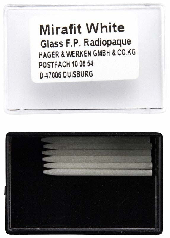 Mirafit® White Wurzelstifte in schwarzer Box mit Etikett.