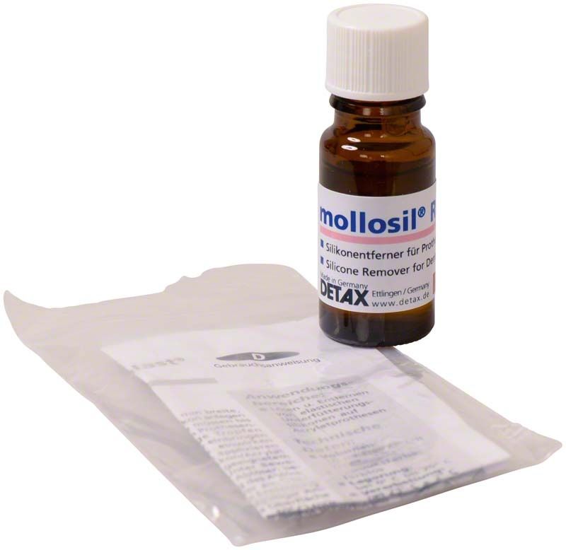 Braune Flasche mollosil® Remover mit Beipackzettel auf weißem Hintergrund.