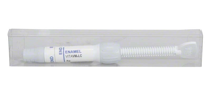 Spritze mit VM LC Enamel dunkel im transparenten Kunststoffetui.