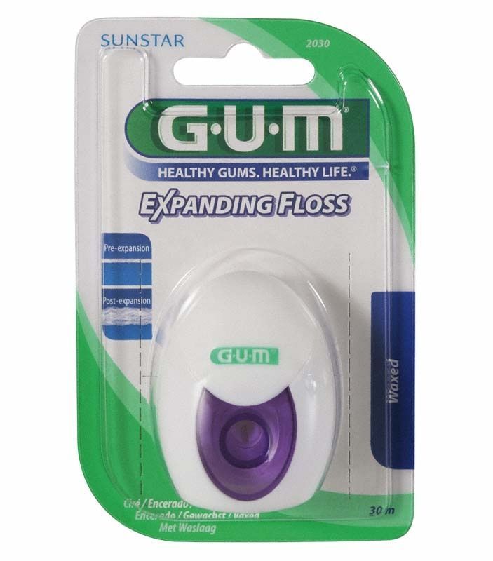 GUM® EXPANDING FLOSS in lila Spender auf grünem Blisterpack.