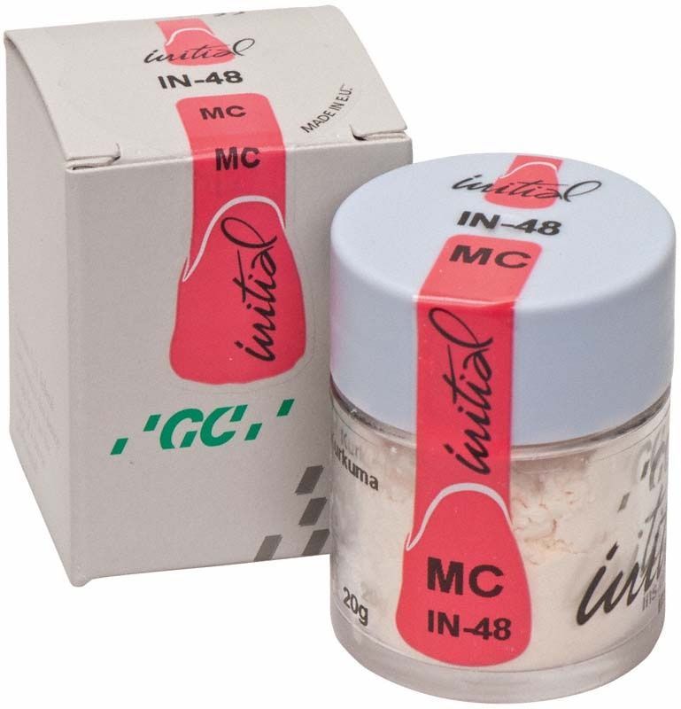 Glasbehälter mit GC Initial MC INside Kurkuma Keramikpulver, 20g, neben Verpackung.
