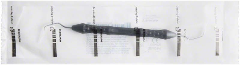 Schwarze Zahnkürette After-GRACEY mit anatomischem Griff in steriler Verpackung.
