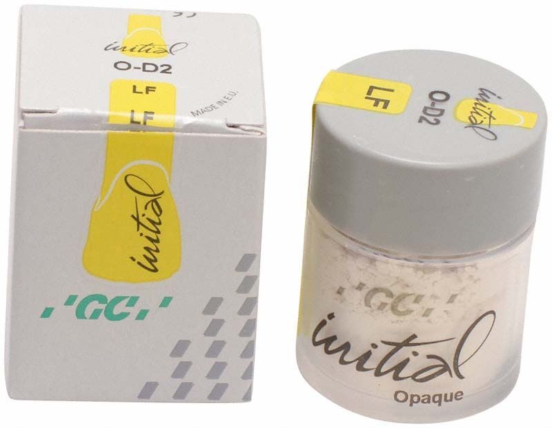 GC Initial LF Powder Opaque OD2 in transparentem Behälter neben der Verpackung