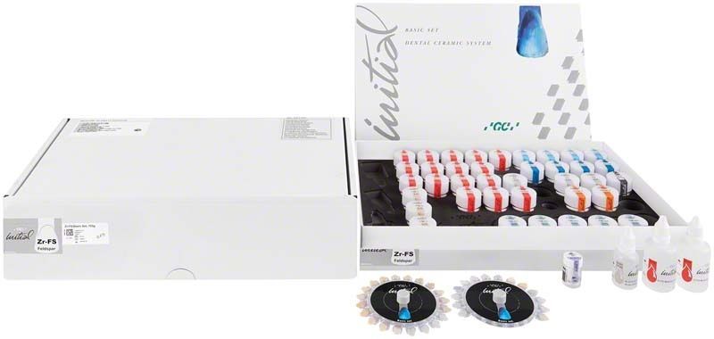 GC Initial Zr-FS Basic Set mit Zahnlabor-Materialien und Farbmusterkarten.