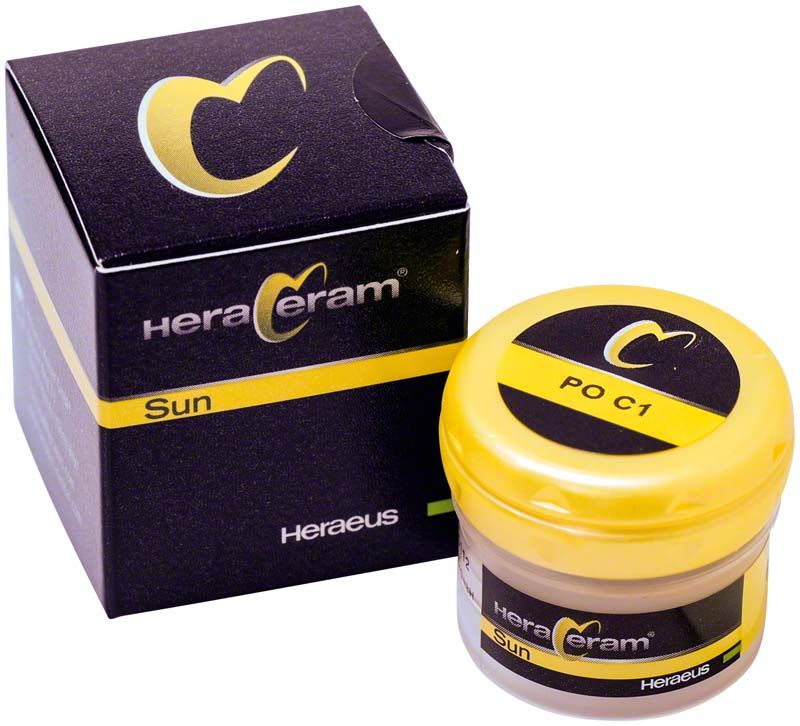 HeraCeram® Sun Pastenopaker PO C1 in gelbem Behälter mit Verpackung.