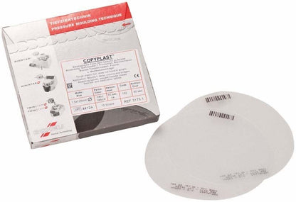 Verpackung und zwei COPYPLAST® Tiefziehfolien für dentalen Einsatz.