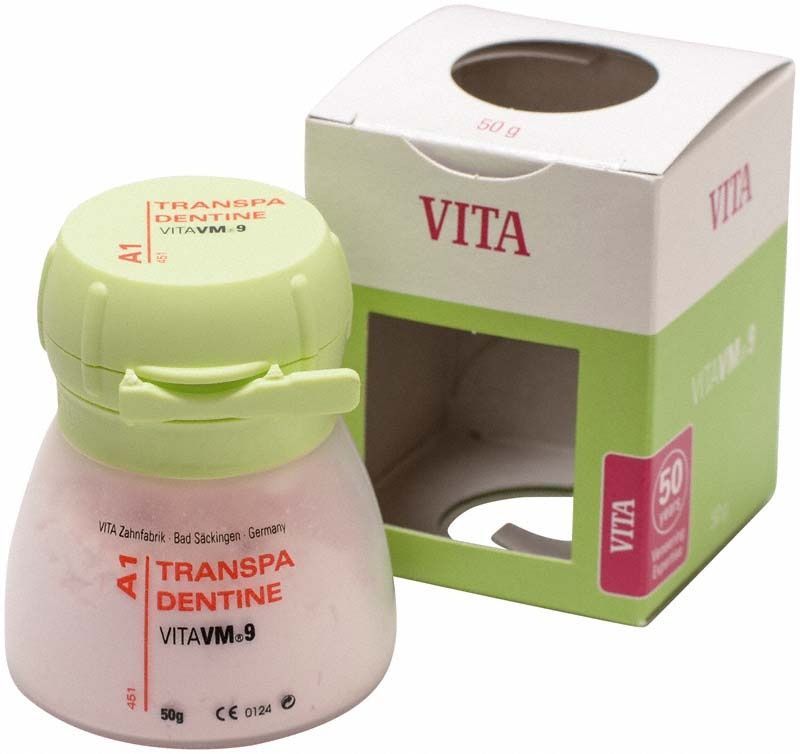 Transpa Dentin VM9 A1, 50g, in grünem Behälter mit Verpackung.