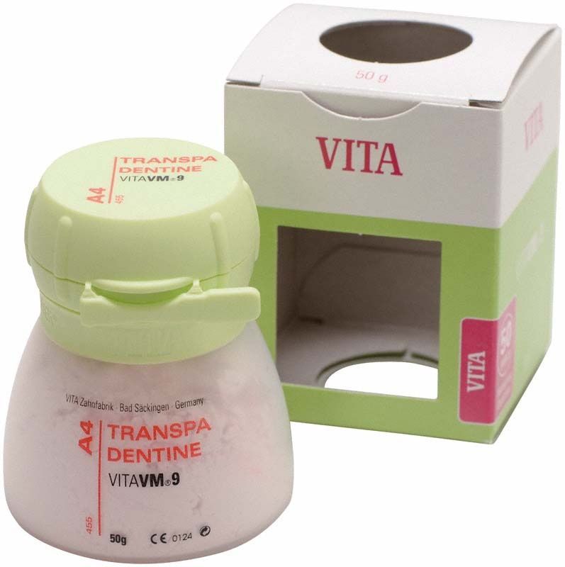 Transpa Dentin VM9 A4 50g Dose mit Verpackung im Hintergrund.