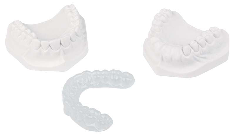 Zahntechnische Dublierformen und transparente Schiene aus COPYPLAST®-Folie.